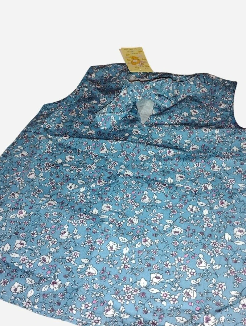 Floral Sleeveless Blouse with Bow Detail – Size 7/8 NWT
